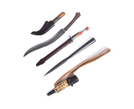 A collection of assorted knives and daggers to include; a spear head with a cruciform section blade and pike, a ' High Life '