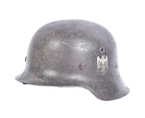 An original WWII Second World War Third Reich Nazi German Army M42 pattern steel Stahlhelm. Single Heer decal to one side, fi