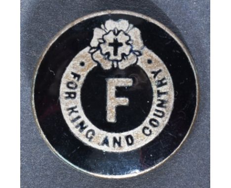 A WWII Second World War British Fascist Members badge. A 3rd pattern example of silver plated construction inlaid with black 