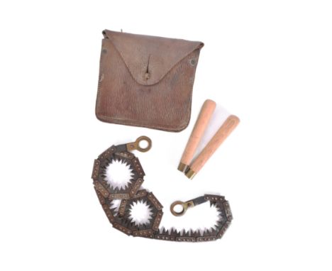 A WWII Second World War British Army / Pioneer Corps chainsaw / coil saw with handles and leather pouch. When extended the sa