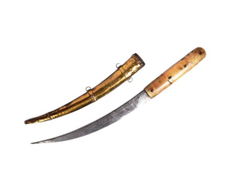 A North African Berber Shula knife / tribal dagger. The horn hilt riveted together with four rivets, carved with straight and