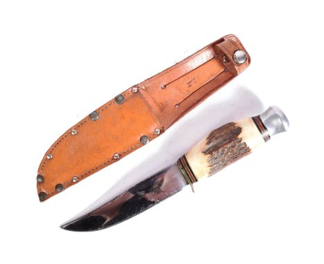 A 20th century Taylor made ' Witness ' Bowie hunting type knife. Horn handled, with white metal supports. Blade etched with m