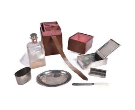 A 19th Century Victorian gentlemen's travelling automobile picnic set containing a glass decanter with cup, sandwich box, pla