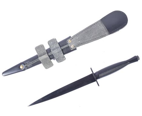 An original current issue FS Fairbairn Sykes British commando knife dagger. The knife having a nut to the pommel, ribbed hand