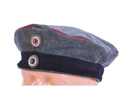 A WWI First World War Imperial German / Prussian Army Machine Gun Detachment feldmutze / field cap. Green wool with a black b
