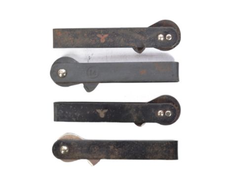 A collection of x4 WWII Second World War Third Reich Nazi German Army can openers. Each stamped with the Eagle Swastika motif