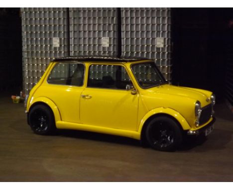 If the world is getting you down, half an hour in this bespoke Mini 'Bumble Bee' could make all the difference. To be sold wi