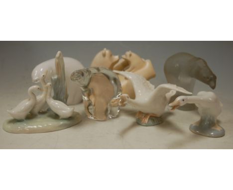 A collection of animal figures to include; Lladro geese, Langham paperweight in the form of a bear etc 
Provenance: Rushbrook