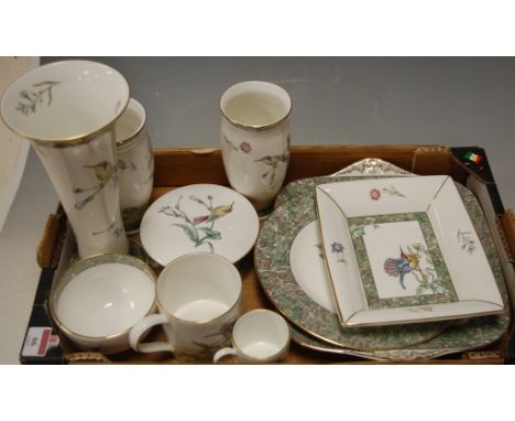 A collection of Wedgwood tablewares in the Hummingbirds pattern, to include; trumpet shaped vase, trinket jar and cover, mug 