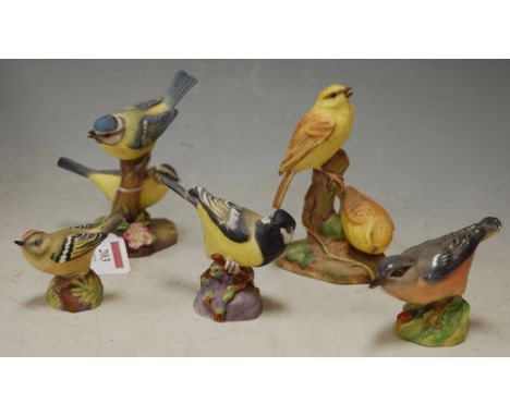 Five ornithological figures to include; Royal Worcester blue-tits yellow-hammer, a great tit, nuthatch, and goldcrest