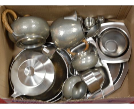A box of miscellaneous metalwares to include an early 20th century hammered pewter four piece tea and coffee service, stamped