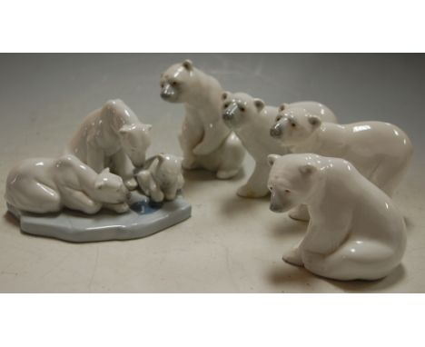 A Lladro figure group of polar bears; together with four singular Lladro figures of bears (5)
Provenance: Rushbrooke Hall, Bu