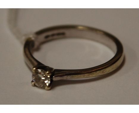 A contemporary 9ct white gold diamond solitaire ring