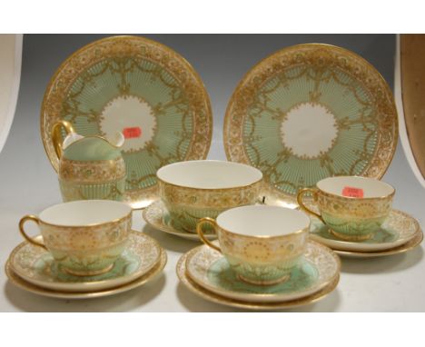 An early 20th century Royal Worcester part tea service, on a turquoise ground with gilt and enamel decoration Condition Repor