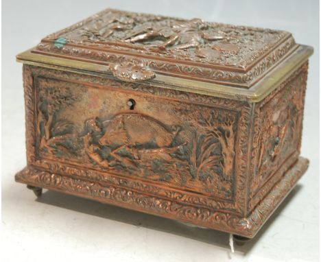 A circa 1900 continental silver plated casket, the panels each well cast with primitive hunting scenes and wild dogs, raised 