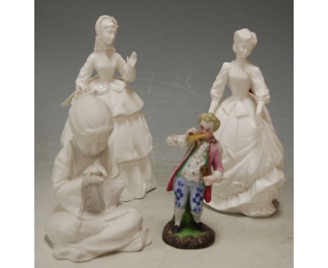 Two Royal Worcester blanc-de-chine figurines; Sincerity and Charity; together with a Kaiser figure of a girl with bird; and a