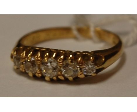 A ladies 18ct gold and rose-cut diamond set five stone ring Condition Report / Extra Information Weight 3.1g.
