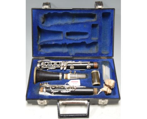 A cased Selmer clarinet 