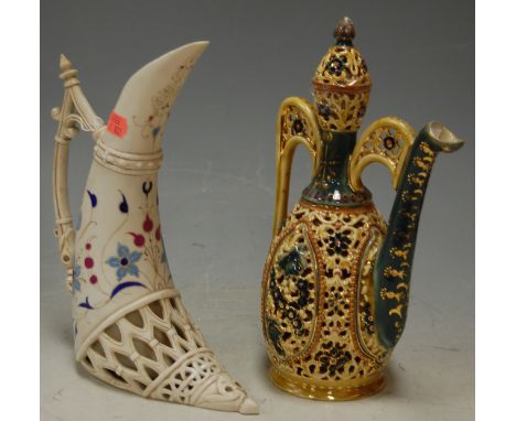 An early 20th century Zsolnay Pecs reticulated coffee pot and cover; together with a continental porcelain tusk jug (2) Condi
