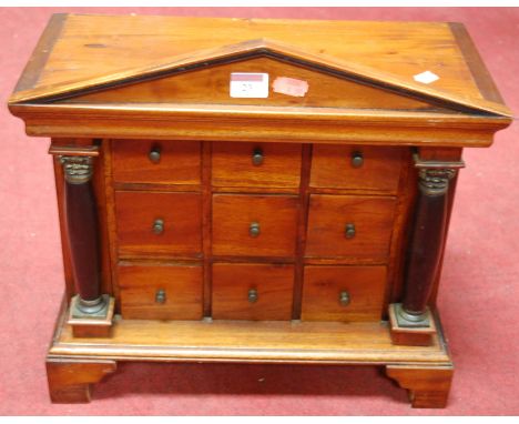 A modern hardwood six-drawer collectors chest of architectural form Condition Report / Extra Information h.42cm, w.43cm, d.22