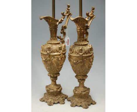 A pair of gilt metal lamp bases in the form of classical ewers (a/f) 