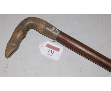 A 19th century walking stick, having rosewood shaft and carved rhino horn handle in the form of a horses hoof Condition Repor