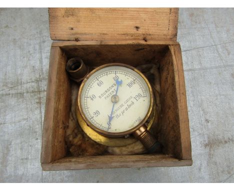 A circa 1930's Bourdon's pressure gauge numbered 10205 with it's wooden storage box 