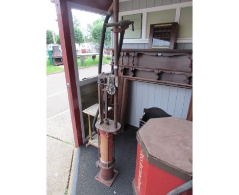 A Bowser vintage fuel pump with gun