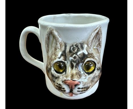 Winstanley Pottery decorative studio pottery cat face cup with glass eyes. Signed to base, numbered 53/100.