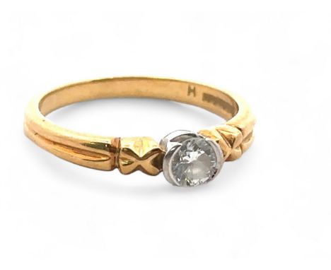 An 18ct gold and 0.25ct diamond solitaire ring, size L. Sponsor HM. weight 2.85g. 