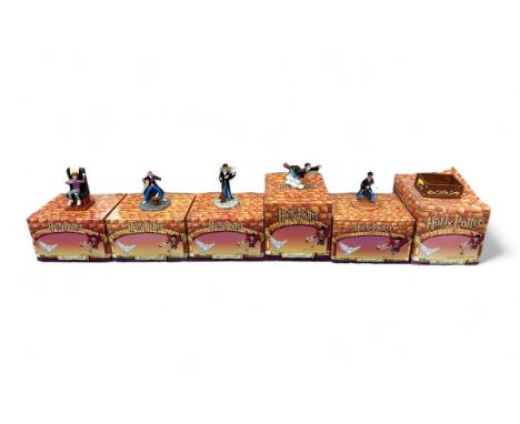 Royal Doulton, selection of six Royal Doulton Harry Potter figurines to include; Harry Casts a Magical Spell, Ron and Scabber