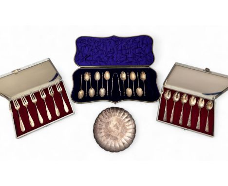 Silver and white metal items. Includes a cased set of 11 silver teaspoons and sugar tongs with marks for William Hutton &amp;