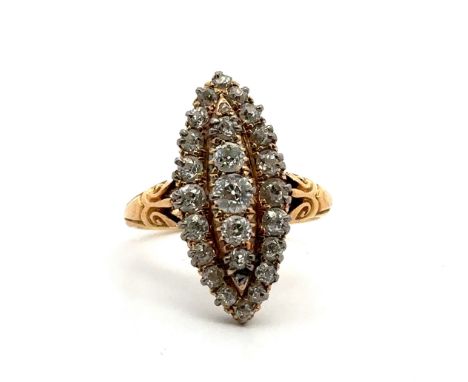 A Diamond ring in a marquise shape set with 27 old cut diamonds. Size M. Principal diamond 0.15ct , total diamond weight appr