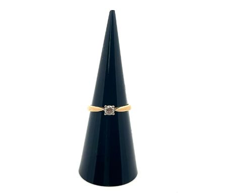 A 0.2ct diamond solitaire ring set in hallmarked 18ct yellow gold, size J. Sponsor E.F. Weight 2.2g.
