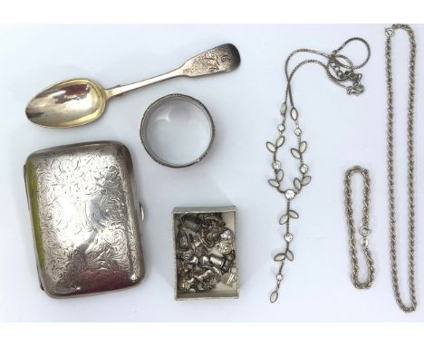 A silver cigarette case with Birmingham 1906 hallmarks (maker unclear), a napkin ring holder by J.T&amp;S Birmingham 1948, an