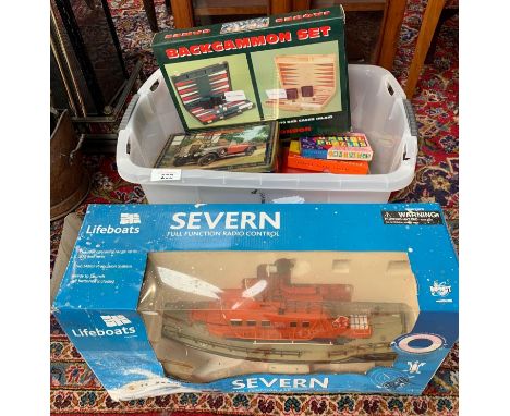 Tub of vintage &amp; modern playing games, boxed backgammon set &amp; boxed radio controlled lifeboat. Viewing/collection at 