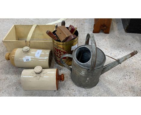 Galvanised watering can, tin of assorted tools, wooden peg box and 2 ceramic bed warmers. Viewing/collection at West Woodland