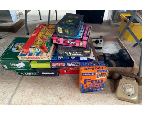 Collection of modern board games together with various camera's and a vintage telephone. Viewing/collection at West Woodlands