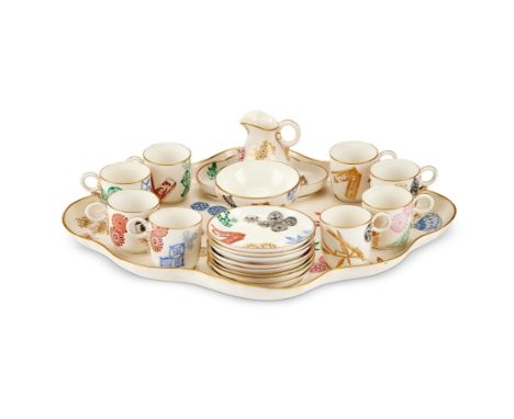 A Royal Worcester Japonisme tea service and tray
Comprising eight cups and saucers, a sugar bowl, a cream jug and stand and a