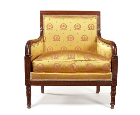 An Empire carved mahogany marquise
In the manner of Jacob, the rectangular padded back, side and seat upholstered in yellow p