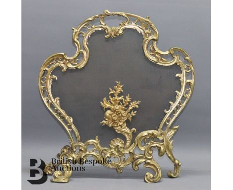 Louis XVI-style brass fire screen.&nbsp;