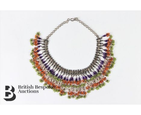 Silver and semi-precious stone collar necklace. The segmented necklace having amethyst and semi-precious stone drops, measuri