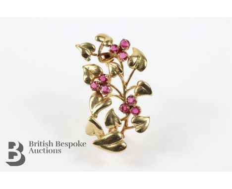 9ct yellow gold and ruby lily brooch, approx 35 x 20 mm, approx 5.5 gms.&nbsp;