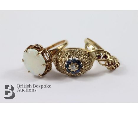 9ct gold opal ring. The ring set with an opal approx 10 x 13mm, size O, a 9ct gold diamond and sapphire ring size Q the ring 