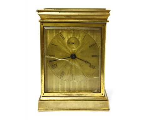 An unusual brass carriage timepiece, late 19th century, with all-over bands of engine turning, a glazed, hinged cover enclosi