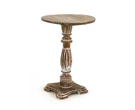 A limed lamp table, 19th century, with a carved column and shaped square base, 41cm diameter 58cm high