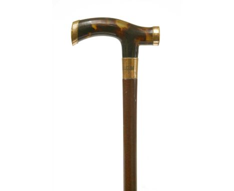 A tortoiseshell and snakewood walking stick , late 19th century, the 'T' shaped handle with gold mounts, hallmarks rubbed , i