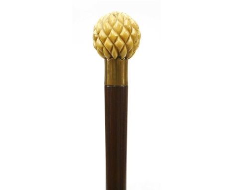 An ivory and snakewood walking stick, 19th century, the carved knob above a plain tapering shaft, 104.5cm long