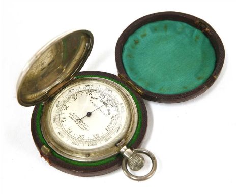 A silver hunter cased barometer/altimeter, 0-10000, by 'Aitchison &amp; Co., Optician to H.M. Govt., London and Leeds', the e