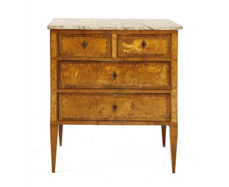 A Continental fruitwood and parquetry commode chest, early 19th century, the rectangular marble top above two short and two l